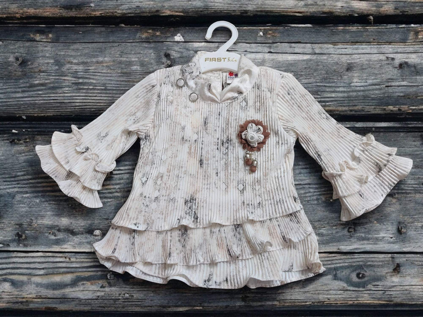 Elegant Floral & Stylish Ruffled white top and beige jeans